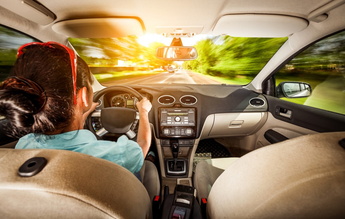 Woman driving a vehicle